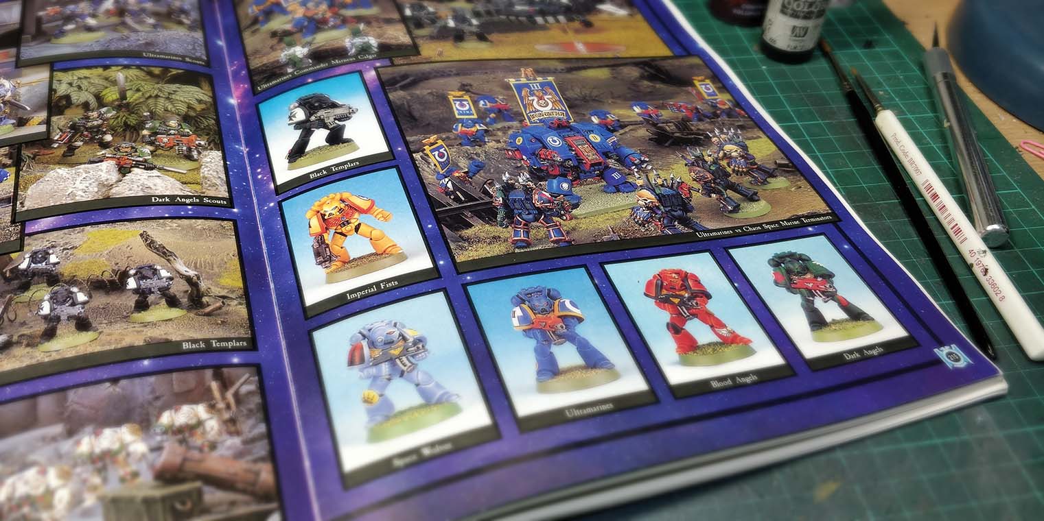 a picture of a book showing painted miniatures